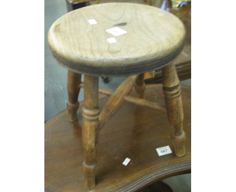 Elm circular stool on ex stretcher support.(B.P. 24% incl. VAT)