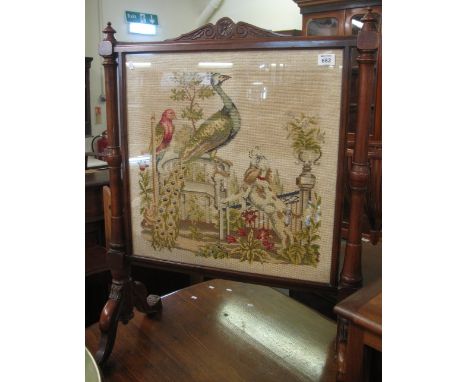 Victorian mahogany fire screen, the panel decorated with birds and hunting dog.(B.P. 24% incl. VAT)