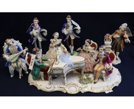 Group of German porcelain musician figures to include; a large group of four figures around a piano, a lute player, two galla