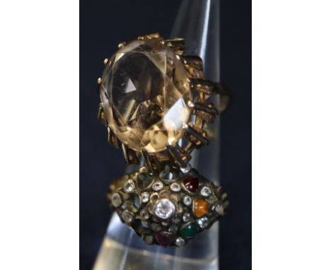 9ct gold smoky quartz ring and a multi-stone ring. (B.P. 24% incl. VAT)