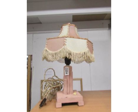 A 1930's table lamp with shade.