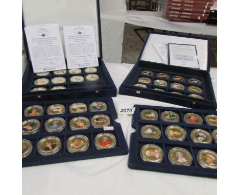 2 cases containing 46 mint gold plated coins 'Diana, Princess of Wales' photographic portrait collection.