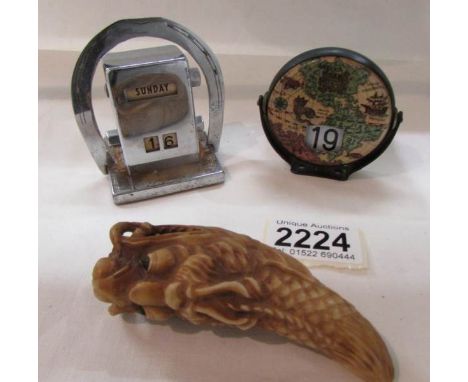2 perpetual calendars and a netsuke.