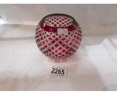 A small overlaid glass lamp shade.