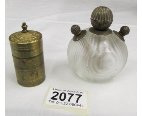 A Victorian glass match striker cigar lighter and a brass go-to-bed vesta.