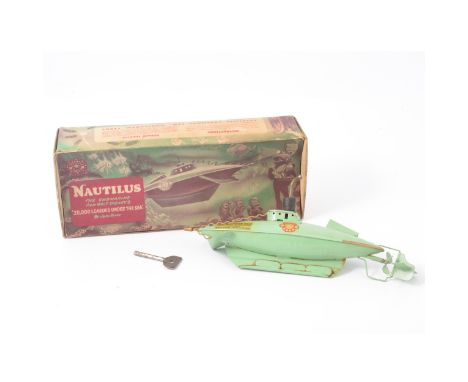 A Sutcliffe model clock-work submarine 'Nautilus' The submarine from Walt Disney's 20,000 Leagues Under the Sea, with key and