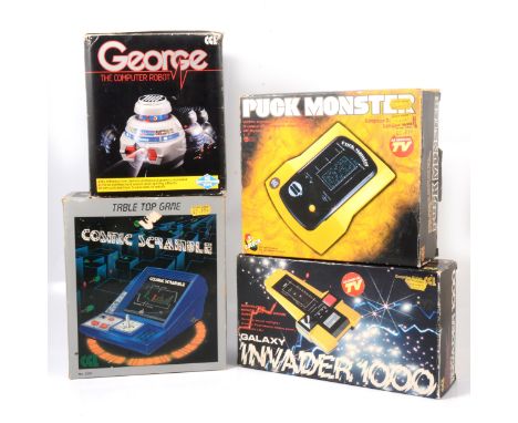 Four CGL electronic battery-operated games; Cosmic Scrambler; George the computer robot; Puck Monster; Galaxy Invader 1000, a
