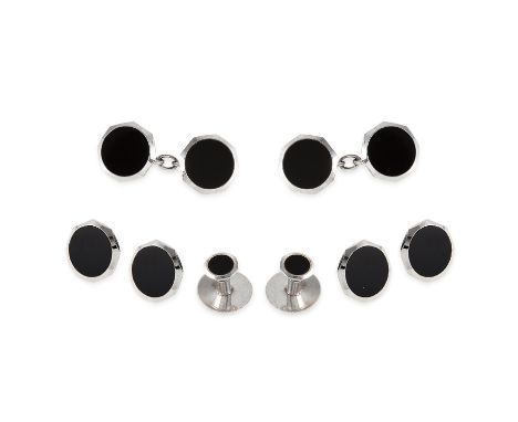 AN ONYX DRESS SET in 9ct white gold, comprising of cufflinks and six button studs formed of a circular polished onyx, stamped