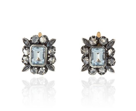 A PAIR OF AQUAMARINE AND DIAMOND EARRINGS in yellow gold and silver, the step cut aquamarines within stylised borders of rose