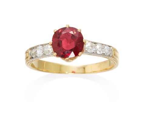 AN ANTIQUE SPINEL AND DIAMOND RING in high carat yellow gold, the 1.45 carat oval cut spinel between round cut diamond set sh