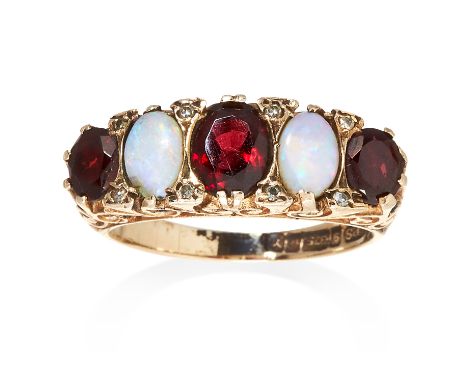 A GARNET AND OPAL FIVE STONE RING in 9ct yellow gold, jewelled with three oval cut garnets and two cabochon opals, full Briti