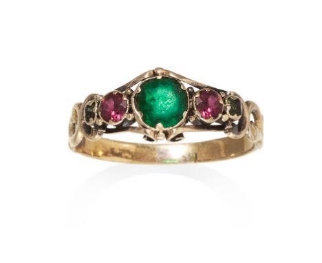 AN ANTIQUE GARNET RING, GEORGIAN in high carat yellow gold, comprising of a green stone between two round cut garnets with tw