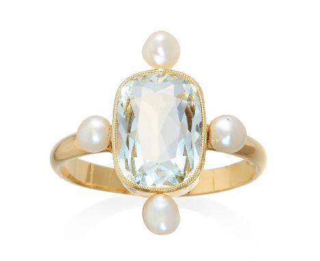 AN ANTIQUE AQUAMARINE AND PEARL DRESS RING in high carat yellow gold, set with a central cushion cut aquamarine flanked by fo