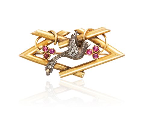 A DIAMOND AND RUBY BROOCH in high carat yellow gold, depicting a bird in leaves, jewelled with rose cut diamonds and round cu