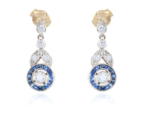 A PAIR OF ANTIQUE DIAMOND AND SAPPHIRE DROP EARRINGS in white gold or platinum, set with round cut diamonds in foliate motif,