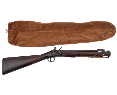 A 19th century brass-barrelled flintlock blunderbuss by H Nock, the 15 1/2 inch three stage barrel having top mounted spring 