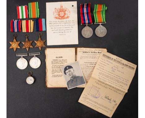 A WWII group of five to 7956022 Tpr. E.D Jones RAC; together with pay book and photograph of recipient and another WWII pair 