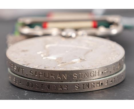 A George V India General Service medal with Northwest Frontier 1930-31 clasp to '9739 Sep Jogindar Singh 4-11 Sikh R' and a G