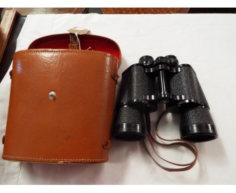 A cased pair of Zenith 12 x 50 field glasses No 3170