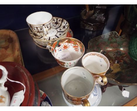 A selection of 19thC coffee cans, teacups and saucers to include Royal Worcester, Minton, Copeland, Coalport and Dresden     