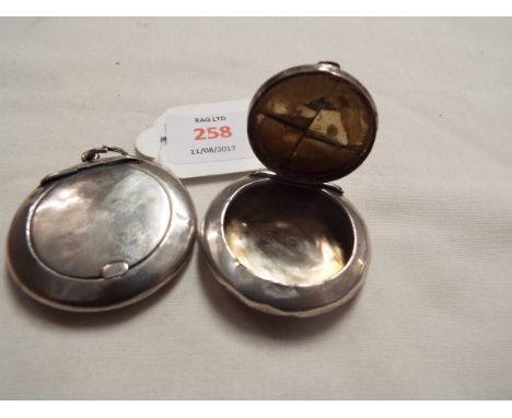 A pair of early 20thC silver circular patch boxes with internal mirrors dated Birmingham 1919