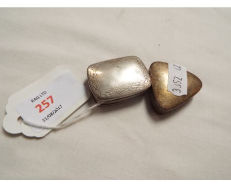Two sterling silver patch boxes, one in the form of a heart and the other incised with scrolling foliate design