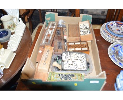 A box of Cribbage boards, dominoes and games