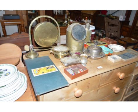 A brass dinner gong on stand; a brass cased gimbaled compass; two WWII medals; two badges and a quantity of various other met