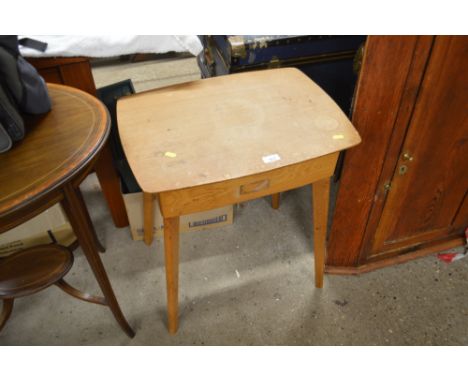 A light oak veneered cutlery table and contents