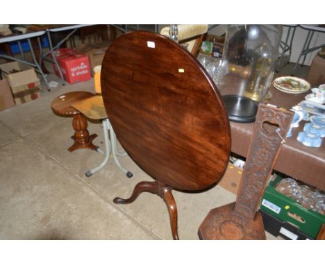 A 19th Century mahogany tilt top tripod table 