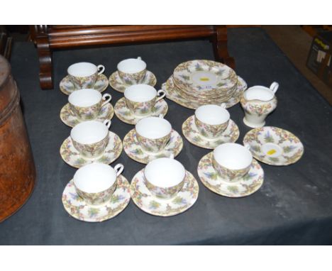 A quantity of Aynsley floral decorated tea cups, saucers and side plates