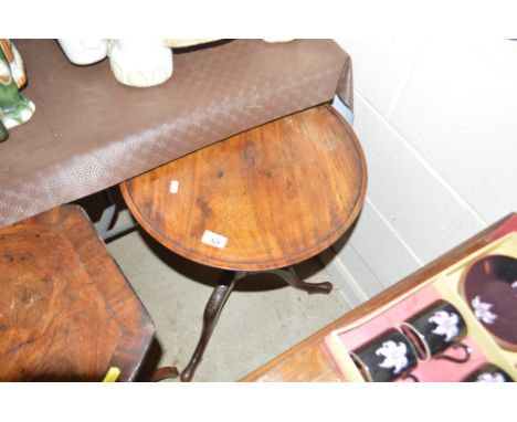 A 19th Century mahogany circular topped tripod table 