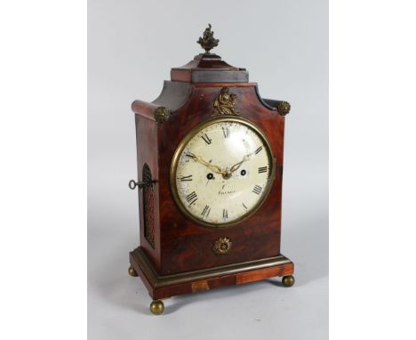 A GEORGE III MAHOGANY BRACKET CLOCK, the case with ormolu finial and mounts, the circular dial indistinctly signed ..........