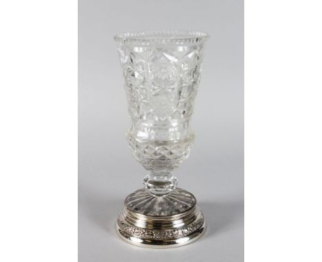 A FRENCH CUT GLASS THISTLE SHAPED VASE with star cut base with silver rim. 11ins high.