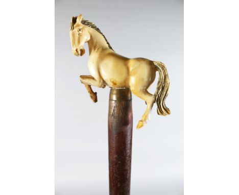 A WALKING STICK with ivory horse handle (AF).