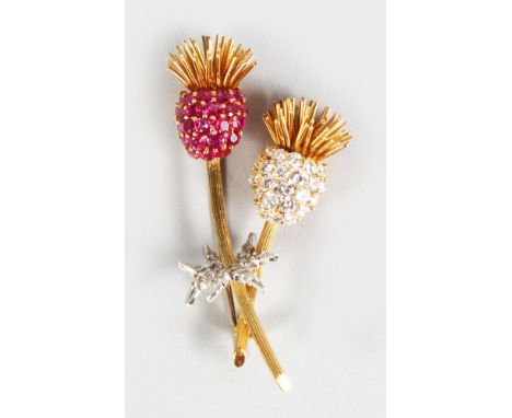 A SUPERB 18CT YELLOW GOLD, DIAMOND AND RUBY THISTLE BROOCH by KUTCHINSKY.