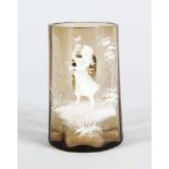 A VICTORIAN MARY GREGORY AMBER TANKARD, CIRCA. 1880, painted with a girl. 3.5ins high.