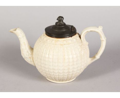 A STONEWARE GLOBULAR TEAPOT with pewter cover.