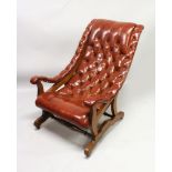 A GOOD BUTTON UPHOLSTERED AND MAHOGANY FRAMED ARMCHAIR.