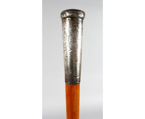 A WALKING STICK with carved ENGRAVED SILVER HANDLE.