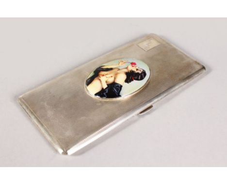 A LARGE ENGINE TURNED CIGARETTE CASE, 7ins x 3.25ins, with inscription, dated 1950, Birmingham 1947, the cover with a glamour