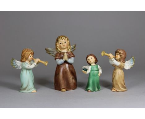 Vier Porzellanfiguren, Engeln, Goebel, 2. Hälfte 20. Jh, H.: von  7,7 bis 12 cm. Guter, altersbedingter Zustand.