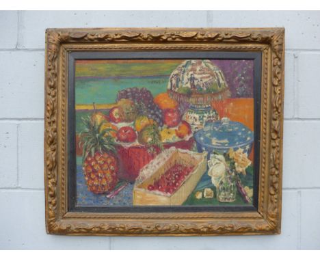 A c1930's oil on canvas still life, baskets of fruits with Oriental lamp and vase of roses. Unsigned work. Set in an ornate f