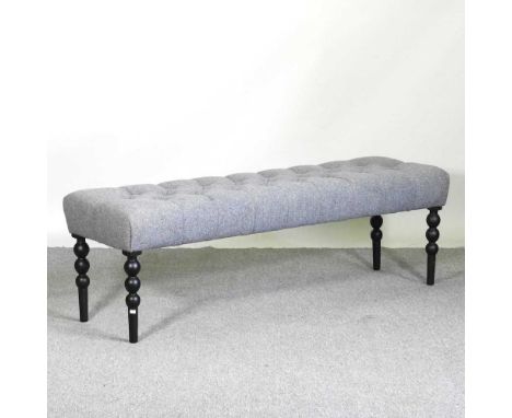 A modern grey upholstered long stool, on bobbin turned legs154w x 47d x 50h cm