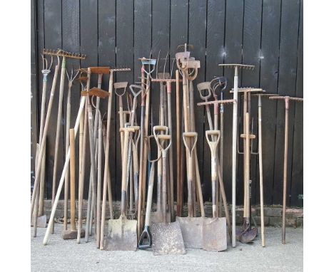 A collection of vintage gardening and hand tools