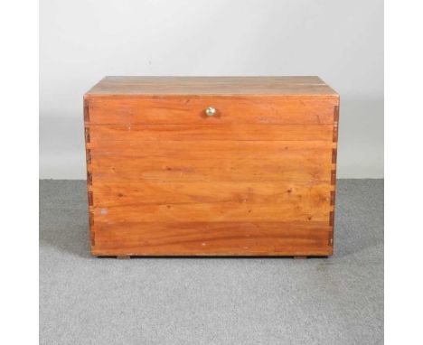 An early 20th century camphor wood trunk, with a hinged lid, 95cm wide95w x 56d x 66h