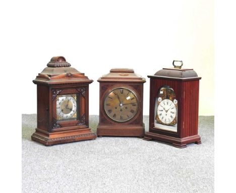 A late 19th century walnut cased mantel clock, 48cm high, together with another and a case (3)Overall condition is generally 