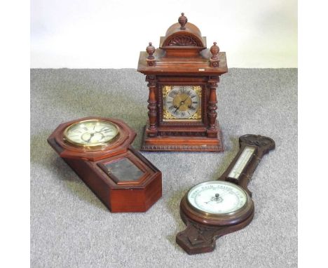 A late 19th century walnut cased mantel clock, 55cm high, together with an aneroid barometer and a wall clock (3)