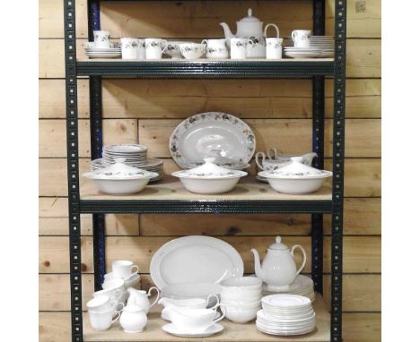 A Royal Doulton Signature Gold tea and dinner service, together with Royal Doulton Larchmont pattern tea and dinner service, 