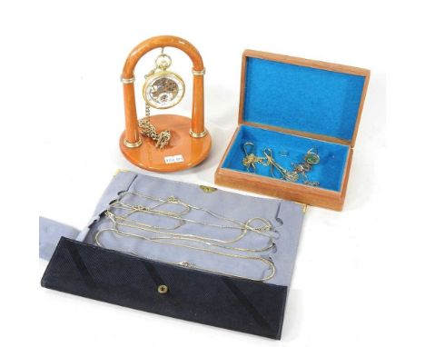 A 9 carat gold signet ring, 2g, size M, together with a 9 carat gold St Christopher pendant, on a fine gold chain, 5g, a pair